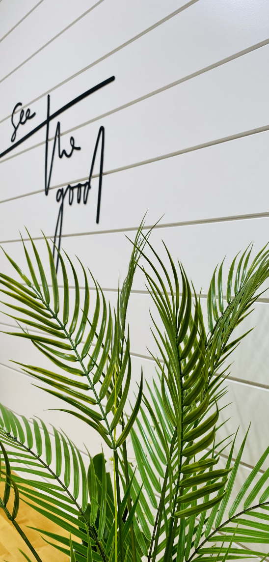 See The Good Wall Sign with Palm Leaves